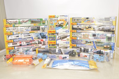 Lot 979 - Takara Tomy nominal H0 gauge Battery operated trains and accessories in original boxes (21)