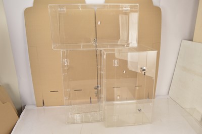 Lot 1017 - Three clear Perspex Acrylic Display cabinets each with two shelves and locks (3)