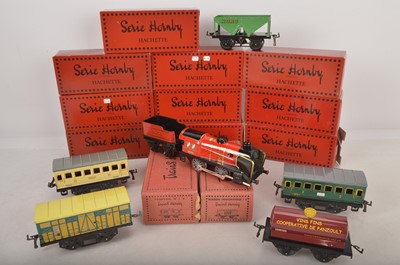 Lot 1108 - Hatchette French Style clockwork 0 Gauge Trains and two French Trains Hornby wagons (19)