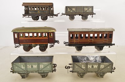 Lot 1183 - Early Gauge 1 Coaches and Wagons by Carette and Bing (6+)