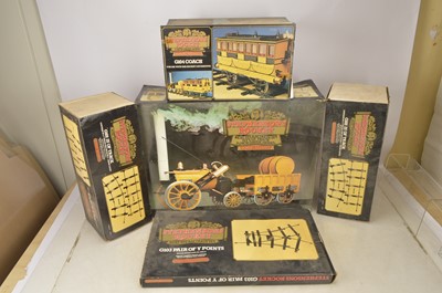 Lot 1197 - A Hornby 3½" Gauge live steam G100 'Rocket' Set with Coach and additional Track (5 boxes)