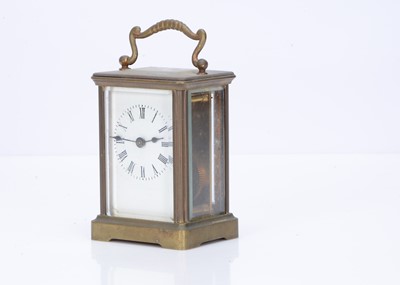 Lot 20 - A late Victorian brass carriage timepiece