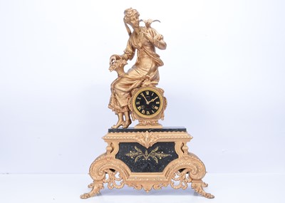 Lot 27 - A French early 20th century spelter and black slate mantel clock