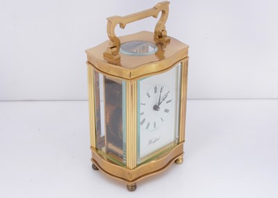 Lot 31 - A modern brass carriage clock timepiece from Woodford