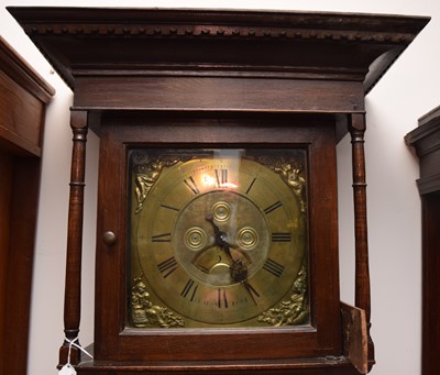 Lot 34 - An early 19th century oak long cased clock