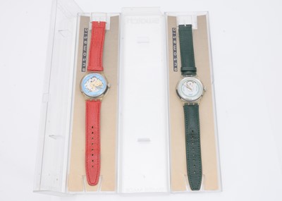 Lot 176 - Two modern Swatch automatic wristwatches