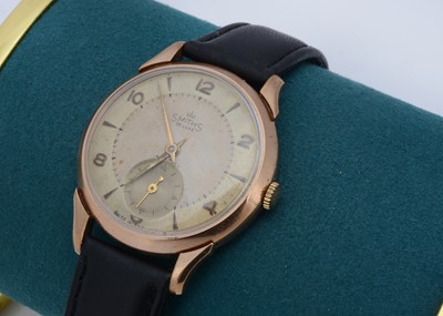 Lot 214 - A 1950s Smiths De Luxe manual wind 9ct gold cased wristwatch