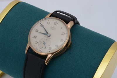 Lot 218 - A 1950s Smiths De Luxe manual wind 9ct gold cased wristwatch