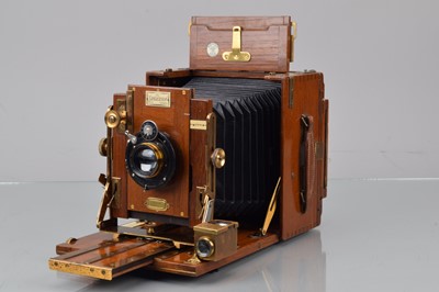 Lot 49 - A Sanderson Half Plate Tropical Model Mahogany & Brass Camera