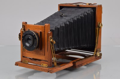 Lot 54 - A Mahogany & Brass Quarter Plate Camera