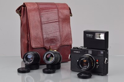 Lot 126 - A Minolta CLE Rangefinder Camera Outfit