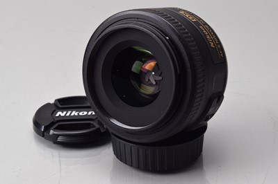 Lot 198 - A Nikon DX AF-S Nikkor 35mm f/1.8G Lens