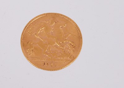 Lot 77 - A small Gold coin in the style of a George V Gold Half Sovereign