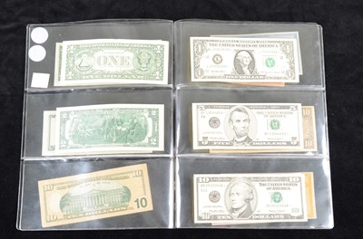 Lot 210 - A collection of fourteen United States banknotes