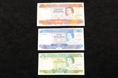 Lot 300 - A collection of six banknotes from Solomon Islands