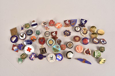 Lot 61 - An assortment enamelled pin badges