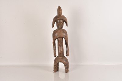 Lot 231 - A well carved African Trible figure