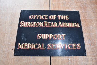 Lot 318 - A vintage glass sign for the 'Office of the Surgeon Rear Admiral Support Medical Services'