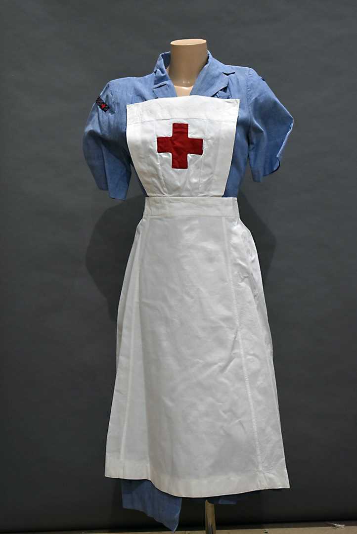 Red Cross Robe Lot 395 - A WWII Period Red Cross uniform and ephemera,