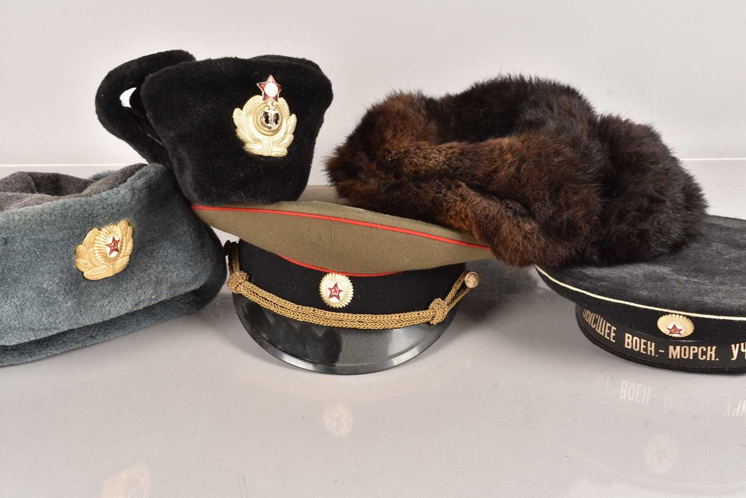 Lot 416 - An assortment of Russian Hats and Caps