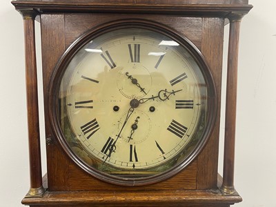 Lot 1 - A Georgian and later long case clock