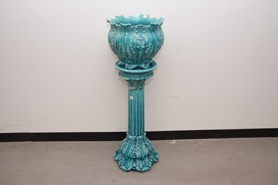 Lot 13 - A late Victorian or Edwardian pottery jardiniere on stand