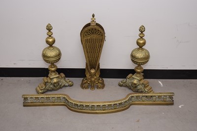 Lot 29 - Four late Victorian and 20th century brass fireside items