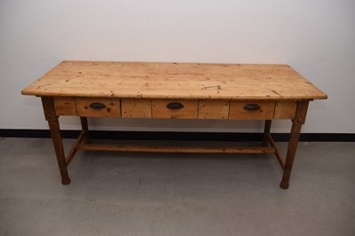 Lot 55 - A large Victorian and later pine kitchen table