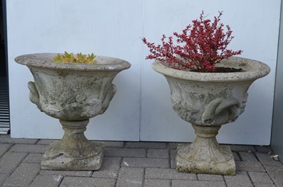 Lot 102 - A pair of reconstituted stone Campana-vase shaped garden urn planters