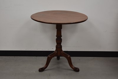 Lot 109 - A circular topped table