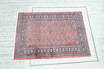 Lot 115 - A Middle Eastern 'Bokhara' wool rug