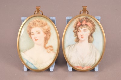 Lot 127 - A near pair of  late Georgian ivory portrait miniatures