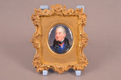 Lot 136 - A 19th century enamelled portrait miniature