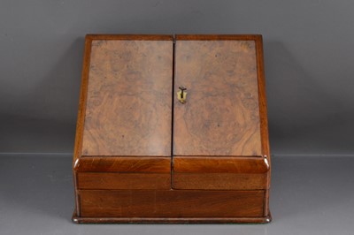 Lot 187 - A 20th century walnut stationary cabinet