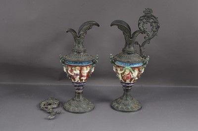 Lot 198 - A pair of Renaissance Revival style bronzed spelter ewers