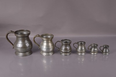 Lot 217 - A graduated set of six 19th Century pewter measures