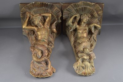 Lot 245 - A pair of large gilded plaster corbel sconces