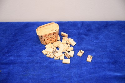 Lot 274 - A 19th century Prisoner of War carved bone set of dominos in a case