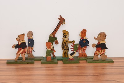 Lot 291 - A set of seven Tiger Tim wooden cut out toys