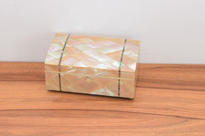 Lot 292 - An art deco mother of pearl and abalone domed top rectangular hinged box