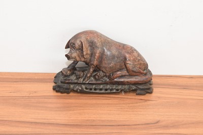 Lot 293 - A Chinese soapstone carved figure of a sow pig and her piglets