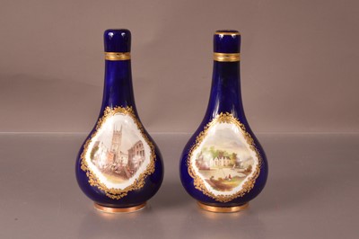 Lot 320 - A pair of British porcelain vases and covers