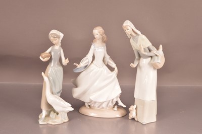 Lot 342 - Three Lladro figures of women