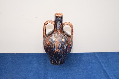 Lot 412 - An late 19th or early 20th century Della Robbia Pottery twin handled bottle vase by Carrie Ann Walker 