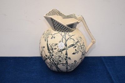 Lot 415 - A Victorian Rugby M & Co pottery jug