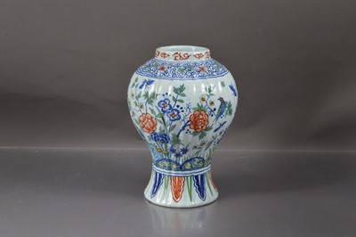 Lot 436 - A French faience hand painted vase