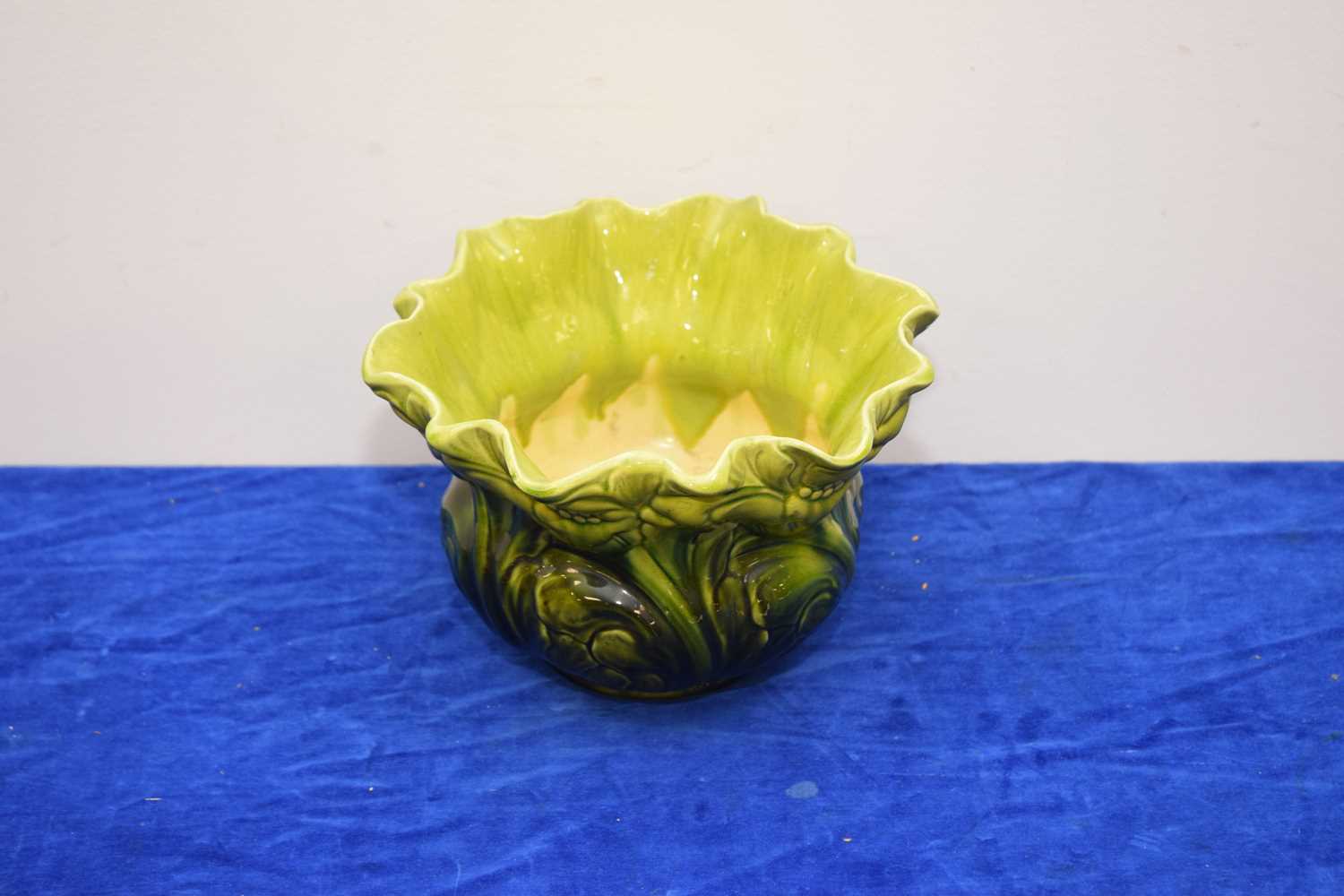 Lot 444 - A Victorian Bretby Pottery green glazed plant pot