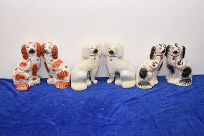 Lot 449 - Three pairs of Staffordshire pottery dogs