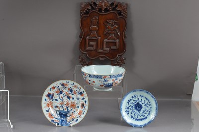 Lot 457 - A Chinese hardwood carving and three oriental porcelain items