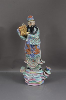 Lot 461 - A late 19th century Canton porcelain figure of Fu